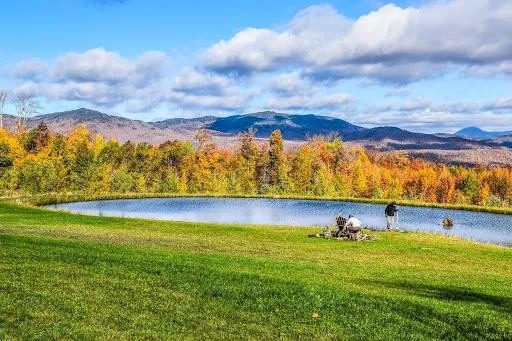 The pond and wooded grounds at the Monastic Academy in Vermont
